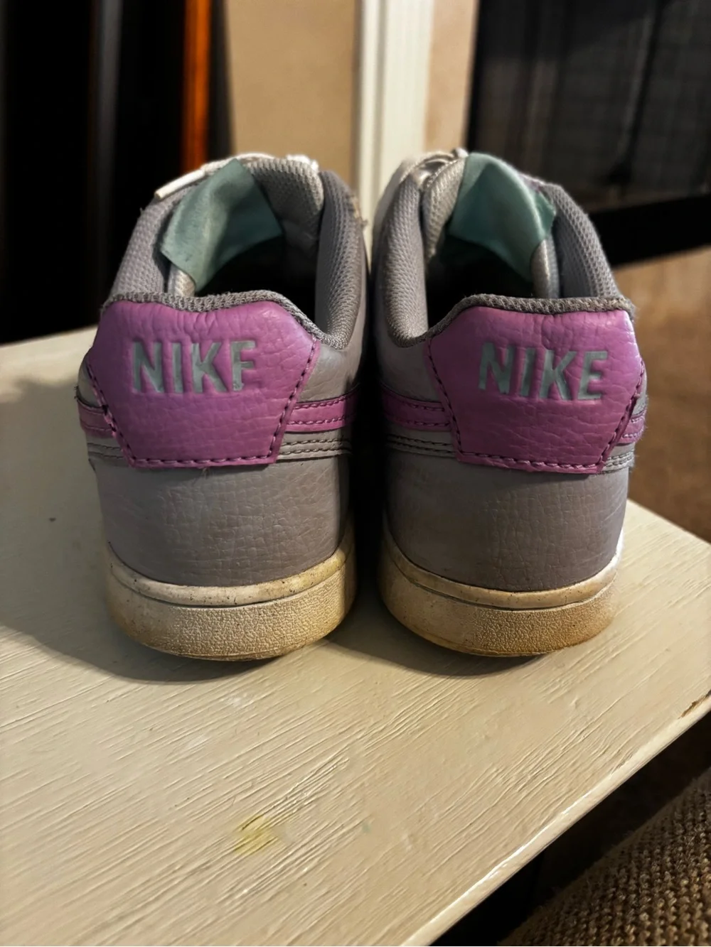 Nike Women’s White Sneakers with Purple Swoosh